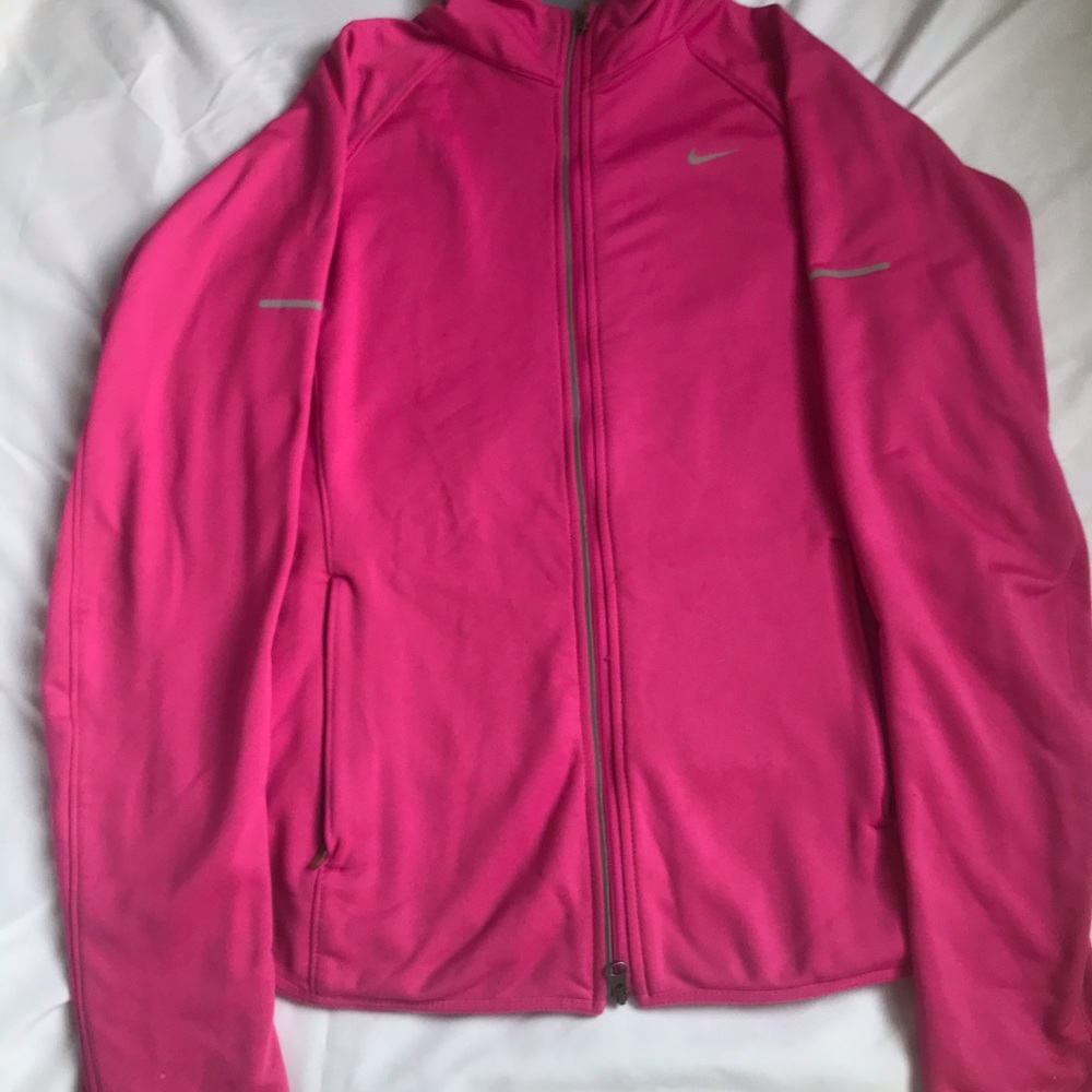 Nike jacket. Size is S and pink color